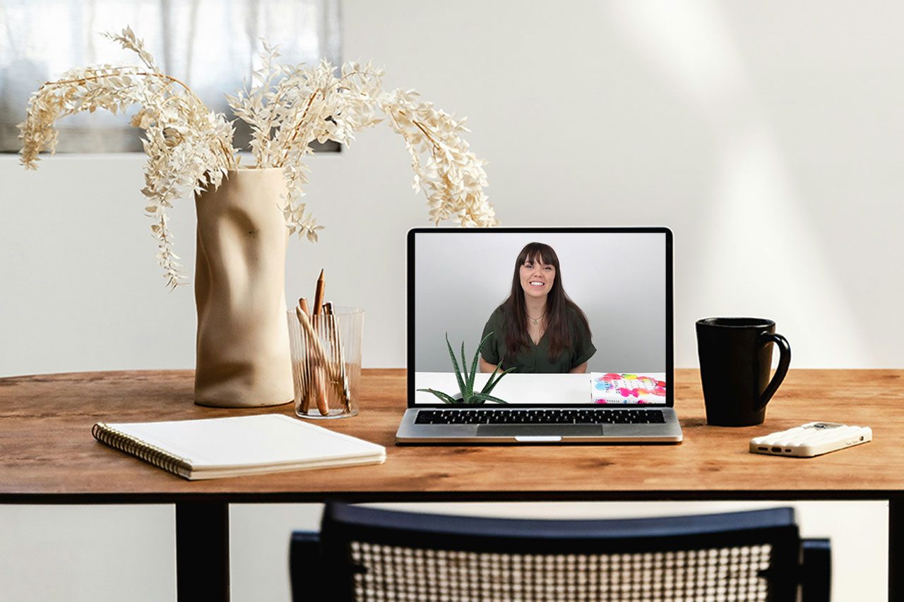 laptop on desk with craft industry alliance course on screen